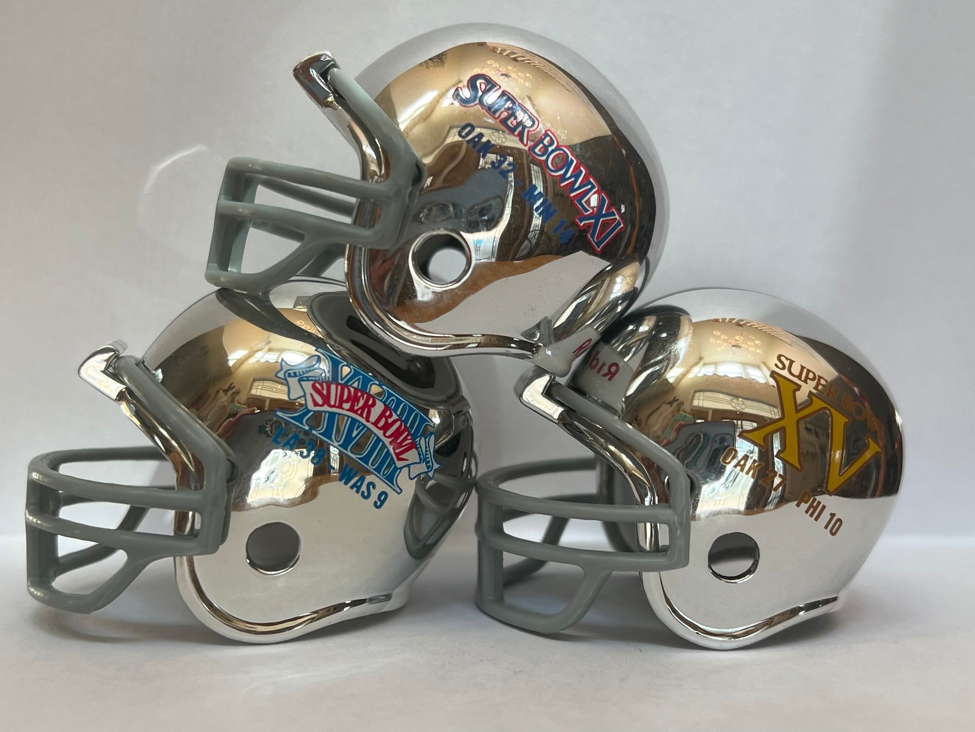 Oakland Raiders Riddell NFL Pocket Pro Helmets Super Bowl XI, XV, and XVIII Championship Chrome (3 Helmets)  WESTBROOKSPORTSCARDS