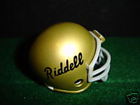 Riddell Logo Gold helmet Pocket Pro (script) from Series 2 WESTBROOKSPORTSCARDS