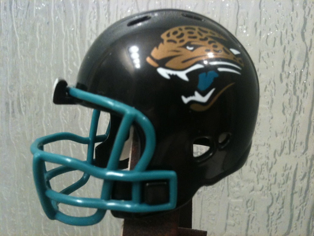 Jacksonville Jaguars Riddell NFL Revolution Pocket Pro Helmet Throwback (Alternate Teal mask)  WESTBROOKSPORTSCARDS