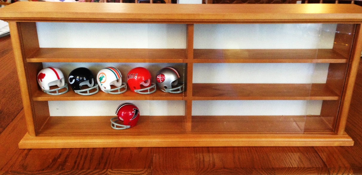 Display cases for helmets, pocket pros, and minis