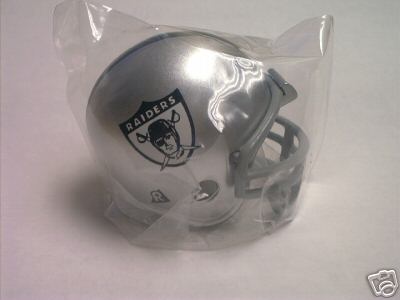 Riddell Pocket Pro and Throwback Pocket Pro mini helmets ( NFL ): Oakland Raiders 1963 Throwback Pocket Pro Helmet (White Logo with Grey Mask) from series II (2)