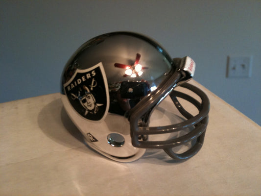 Riddell Pocket Pro and Throwback Pocket Pro mini helmets ( NFL ): Oakland Raiders Chrome Pocket Pro Helmet