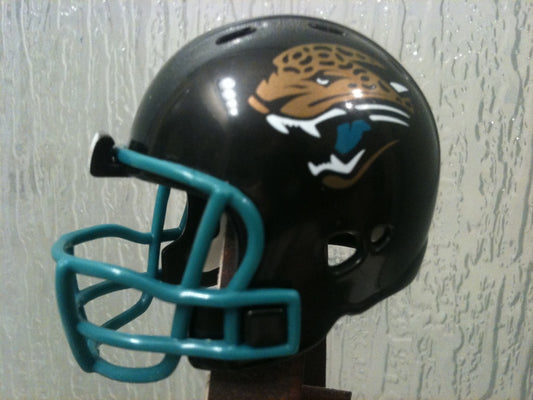 Riddell Pocket Pro and Throwback Pocket Pro mini helmets ( NFL ): Jacksonville Jaguars Revolution Pocket Pro Helmet (Alternate Teal mask)